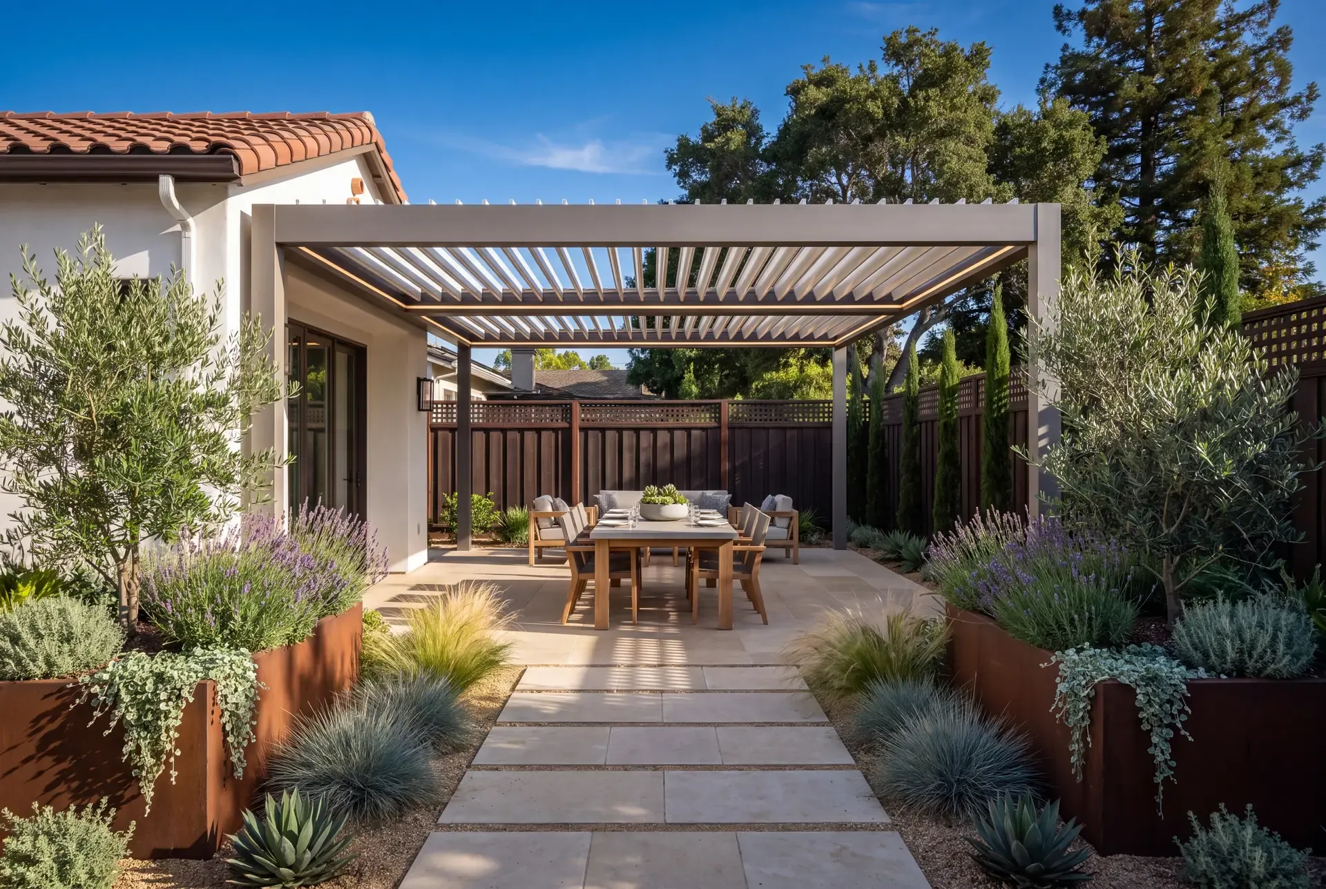 Modern aluminum louvered patio cover in a South Bay backyard showing adjustable pitch and integrated lighting
