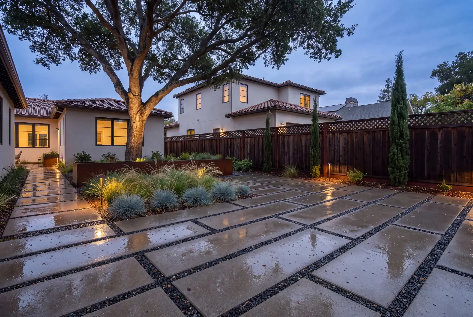 Installed permeable paver driveway with visible aggregate-filled joints and integrated drainage