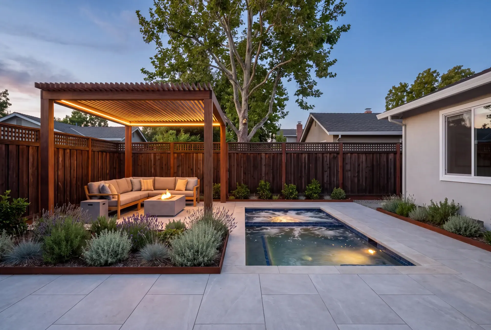 Compact South Bay backyard with a limestone-trimmed spa beside an IPE pergola